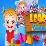 Copil cu păr blond, purtând roșu, se joacă cu forme geometrice lângă un semn pe care scrie Learn Shapes