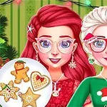 Două personaje feminine cu părul roșu și alb stau lângă un brad de Crăciun și țin o farfurie cu biscuiți de Crăciun, purtând ochelari și îmbrăcăminte festivă