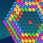 Un hexagon format din bile colorate în nuanțe de albastru, galben, roșu, verde și violet, cu un fundal albastru închis și o bila roșie în centru îndreptată spre ele