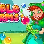 Desen colorat cu o fată zâmbitoare îmbrăcată în verde, ținând o baghetă și înconjurată de bile colorate și textul Bubble Charms