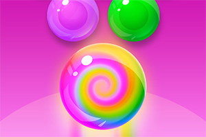Bile colorate și luminoase pe un fundal roz, cu o bilă mare centrală având un model spirală curcubeu