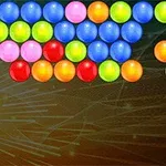 Bile colorate aranjate în rânduri pe un fundal abstract