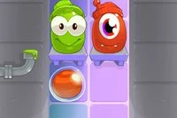 Jucătorii din Candy Monsters hrănesc monștrii cu bomboane de culoarea