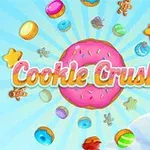 Dulciuri colorate și diverse, inclusiv o gogoașă roz cu glazură, pe un fundal albastru deschis