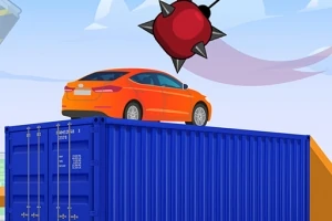 O mașină portocalie este așezată pe un container albastru, cu un obstacol cu țepi plutind deasupra