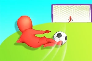 Figurină roșie șutând o minge de fotbal spre o poartă pe un teren verde