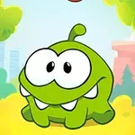Un personaj verde cu ochi mari și dinți ascuțiți, într-un peisaj de pădure colorată