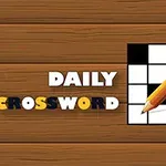 O imagine cu textul Daily Crossword pe un fundal de lemn și un creion portocaliu plasat pe un chenar alb-negru de cuvinte încrucișate