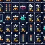 Piese cu simboluri chinezești colorate, aranjate pe un fundal întunecat