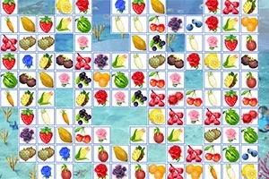 Plăci cu imagini de fructe și flori colorate aranjate într-un model tip puzzle pe un fundal albastru