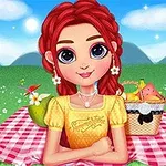 Tânără cu păr roșu și ochi mari se relaxează pe o pătură de picnic, înconjurată de flori și un coș de picnic