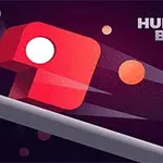 Un cub roșu cu un cerc alb pe el alunecă pe o platformă, înconjurat de sfere portocalii pe un fundal mov închis, cu textul HUNGRY BOX în colțul din dreapta sus