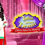O femeie îmbrăcată în rochie tradițională indiană, cu fundal roz și purpuriu, și un logo colorat galben și albastru în partea dreaptă