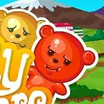 Ursuleți colorați din jeleu pe un fundal cu peisaj montan și clădiri colorate