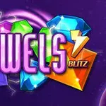Textul „Jewels Blitz” scris cu litere mari și strălucitoare, înconjurat de diamante colorate pe un fundal violet