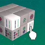 O structură tridimensională formată din cuburi mici cu simboluri și o mână care indică unul dintre cuburi