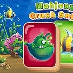 Două piese de mahjong cu pești colorati într-un fundal subacvatic vibrant