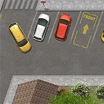 Parcare cu patru mașini colorate văzută de sus, cu o zonă marcată „FRONT” și spații verzi în apropiere
