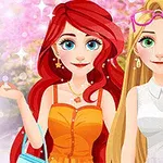 Două personaje animate, una cu păr roșu și alta cu păr blond, îmbrăcate în rochii colorate și accesorii, stau împreună în fața unui fundal cu flori roz