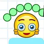 Un emoji galben cu ochi albaștri și expresie veselă, înconjurat de bile verzi, alături de un creion galben pe un fundal caroiat