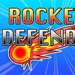 Textul „Rockets Defender” în fața unei imagini cu o cometă strălucitoare pe un fundal albastru