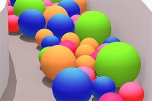 Bile colorate de diferite dimensiuni sunt aranjate într-un șanț sau coridor