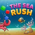 Un homar zâmbitor sub apă aruncă cuburi colorate, alături de un pește și corali, cu textul THE SEA RUSH deasupra